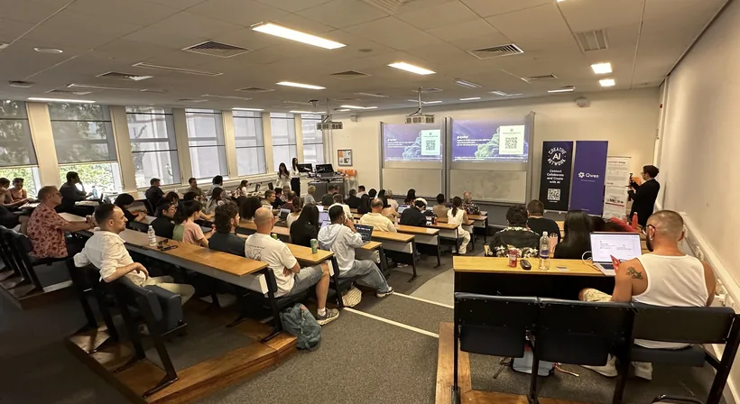 IPVISE AI Community London meetup — audience at a lecture-hall talk